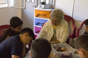 Beryl Cheal working with children